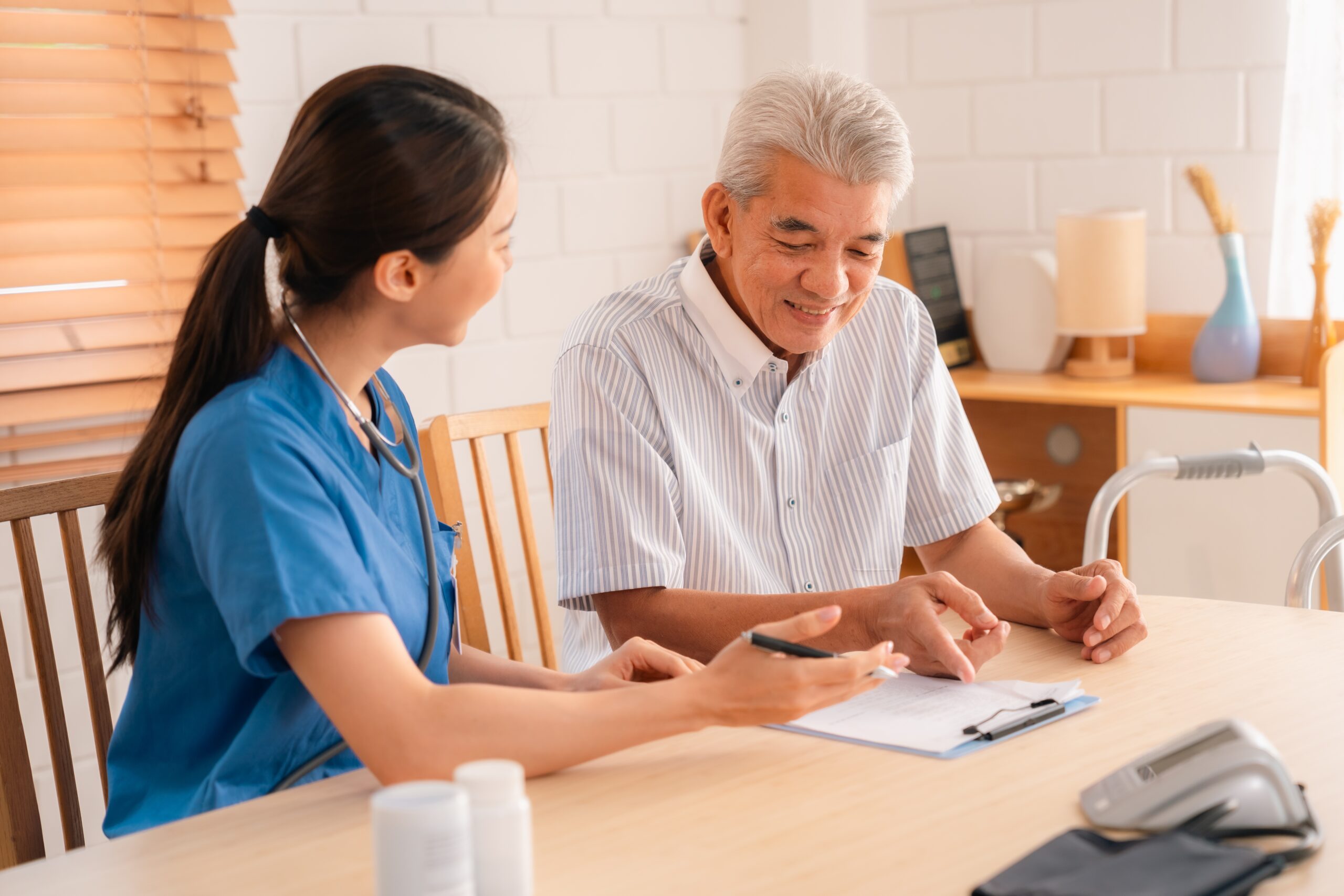 Senior,Man,Receives,Medical,Check-up,Therapy,From,Doctor,In,Hospital